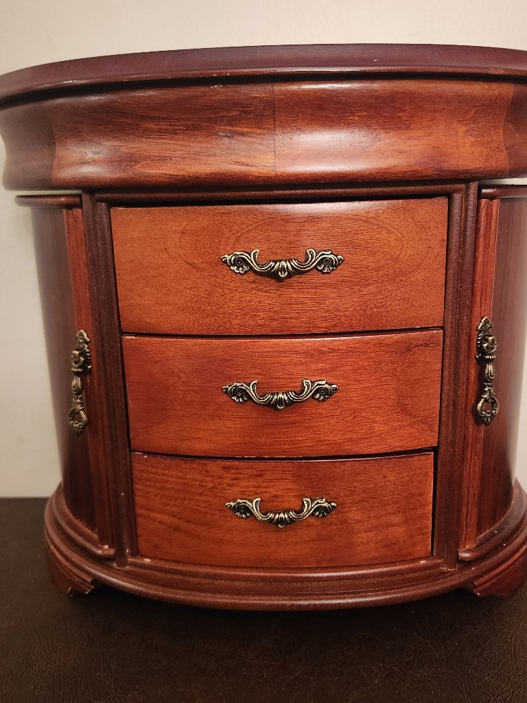 Large Solid Wood Armoire Jewelry Box Has A Rectangular Shape